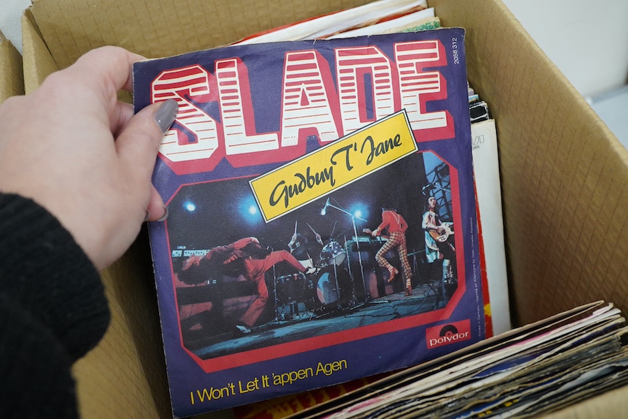 Four boxes of 7 inch singles, on record labels including; Columbia, Pye, Oriole, Stax, Top Rank, Parlophone, etc. artists include; Tom Jones, Otis Redding, The Seekers, Humphrey Lyttelton, Chris Barber, Chuck Berry, Clif